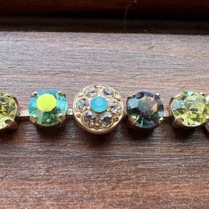 Gold Marianna bracelet missing two crystals